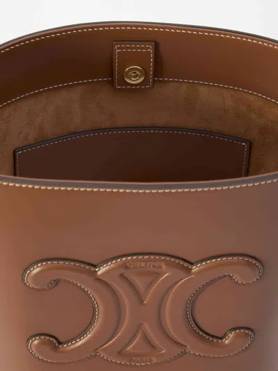 Celine Small Triomphe Leather Bucket Bag In Smooth Calf Leather In Brown