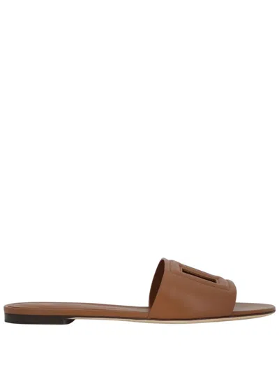 Dolce & Gabbana Slide Sandals With Cut Out Logo In Brown