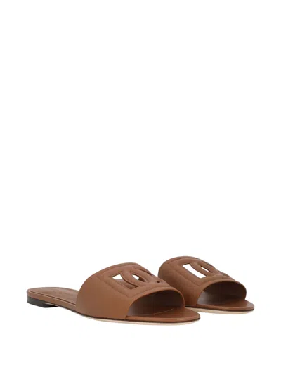Dolce & Gabbana Slide Sandals With Cut Out Logo In Brown