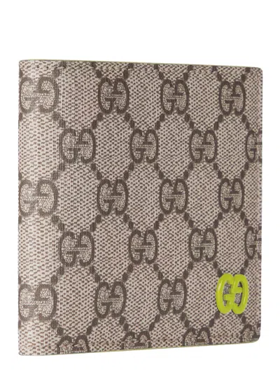 Gucci Men Beige Bi-fold Wallet With Double G Logo Plaque On The Front In Gg Canvas Man In Brown