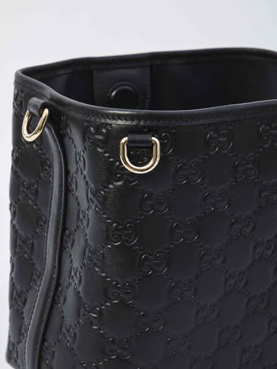 Gucci Gg Emblem Small Leather Bucket Bag In Black