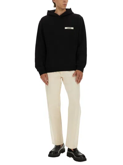 Jacquemus The Gros Grain Zip-up Hooded Sweatshirt In Black