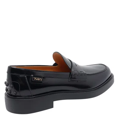 Tod's Women Leather Loafers In Black