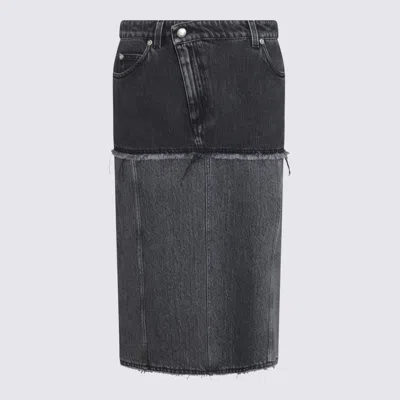 Alexander Mcqueen Mcqueen Two-tone Low Rise Denim Midi Skirt In Black
