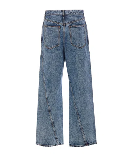 Alaïa Twisted Stonewashed Denim Jeans In Blue