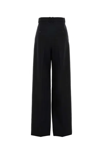 Saint Laurent Wool Trousers With Wide Leg And Pleats