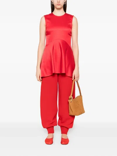 Jw Anderson Sleeveless Asymmetric Blouse In Red