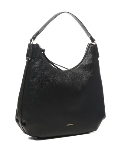 Coccinelle Malory Grained-leather Shoulder Bag In Black