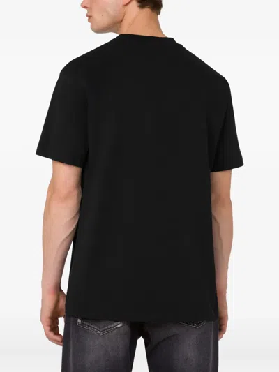 Moschino T-shirt Whit Maxi Print In Black