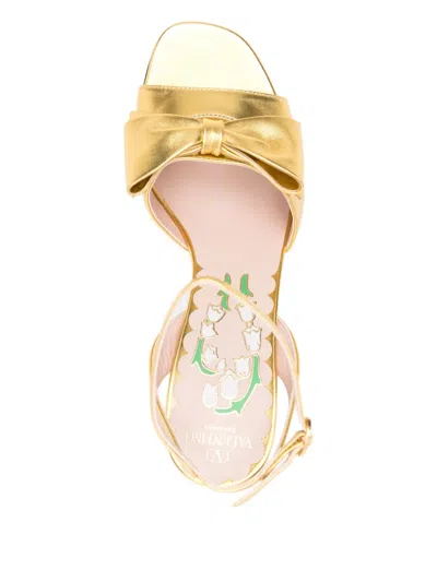 Valentino 100mm Bow-embellished Ankle-strap Sandals In Gold