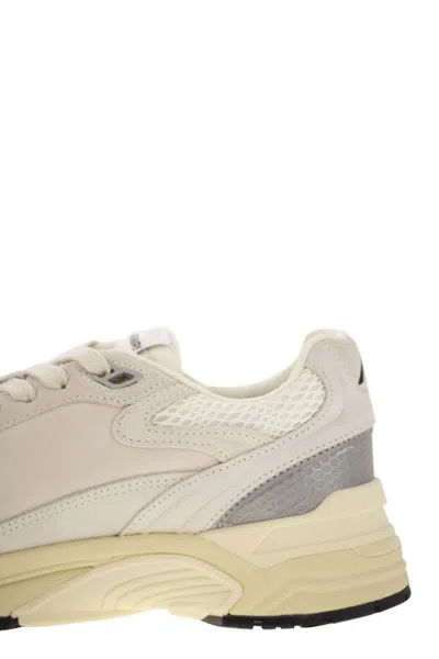 Autry Classic Leather And Mesh Panel Sneakers In Neutral