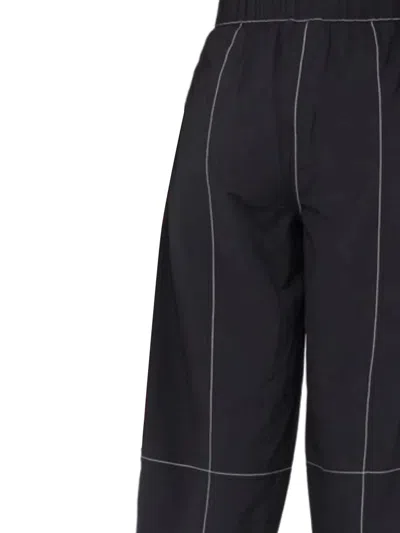 Ganni Womens Black Curved-leg Mid-rise Organic Cotton-blend Trousers In Black