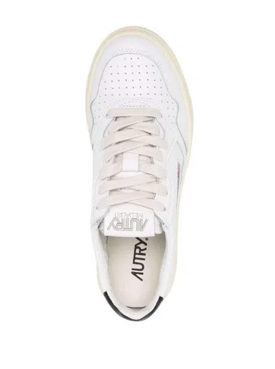 Autry Woman's White Leather Sneakers With Black Heel Tab