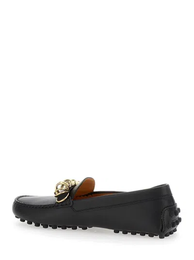 Tod's Black Loafers With Ring Detail On The Front And Rubber Sole In Leather Woman