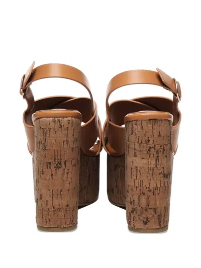 V73 Crossover Wedge Sandals In Brown