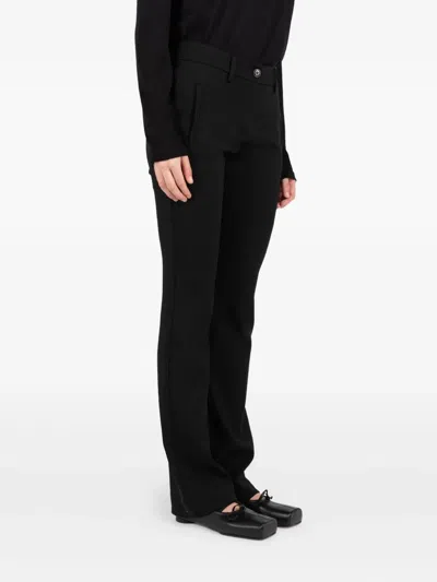 Société Anonyme Pocket-detail Trousers In Black