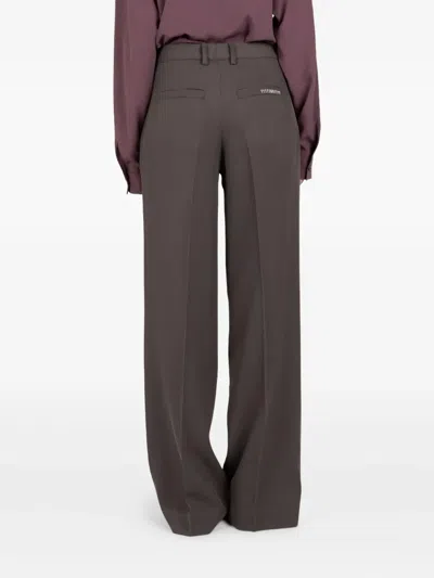 Société Anonyme Pleated Trousers In Brown