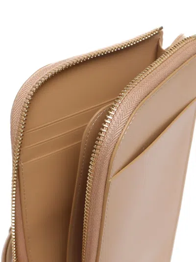 Ferragamo Gancini-plaque Zip-around Wallet In Brown