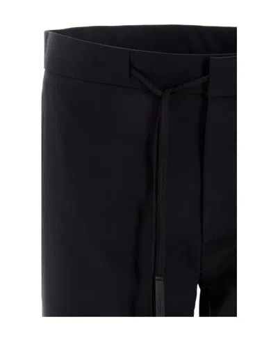 Maison Margiela Four Stitch Detail Tailored Trousers In Black