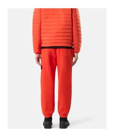 Stone Island Loose-fit Joggers With Pockets And Elasticated Cuffs In Red