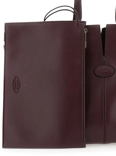 Tod's Bordeaux Tote Bag With Two Top Handles And Embossed Logo Lettering On The Front In Burgundy