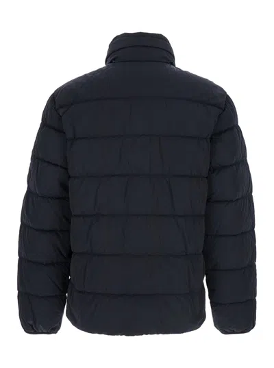 C.p. Company Blue Down Jacket With Fixed Hood And Logo Plaque On The Sleeve In Tech Fabric Man In Blue