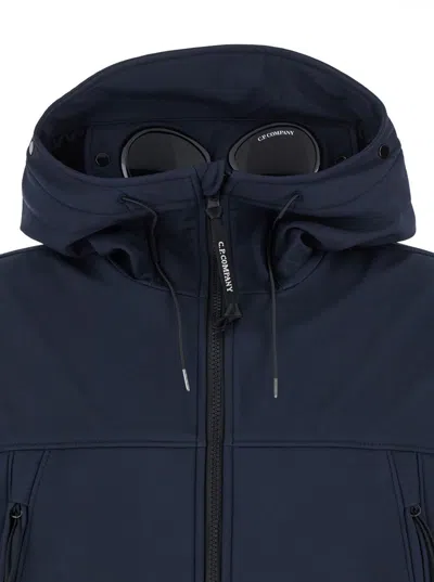 C.p. Company Blue Jacket With Drawstring Hood And Decorative Googles In Black