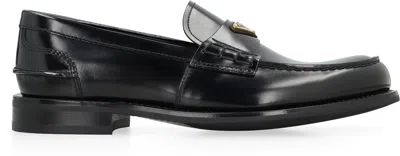 Prada Triangular Plaque Loafers In Black