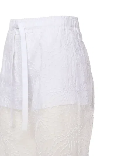 Genny Floral-lace Drawstring Trousers In White