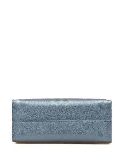 Pre-owned Louis Vuitton 2021-2025 Metallic Monogram Giant Empreinte Onthego Pm Satchel In Blue