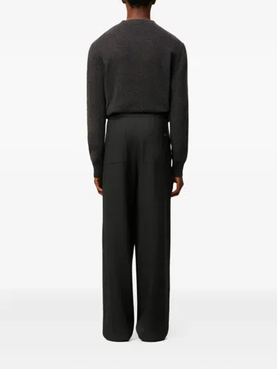 Ami Alexandre Mattiussi Elasticated Patch-pocket Trousers In Black