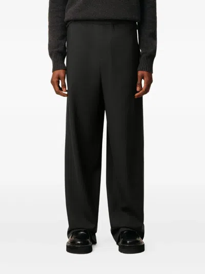 Ami Alexandre Mattiussi Elasticated Patch-pocket Trousers In Black