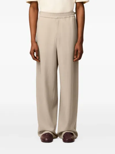 Ami Alexandre Mattiussi Elasticated Wool Trousers In Brown