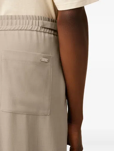 Ami Alexandre Mattiussi Elasticated Wool Trousers In Brown