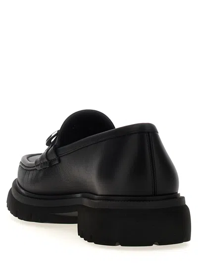 Ferragamo Chunky Sole Loafers With Metal Buckle Detail In Black
