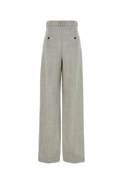 Saint Laurent Wool Trousers With Wide Leg And Pleated Front