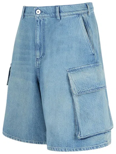 Jw Anderson Light Blue Bermuda Shorts With Cargo Pockets And Logo Patch On The Back