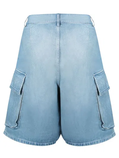 Jw Anderson Light Blue Bermuda Shorts With Cargo Pockets And Logo Patch On The Back
