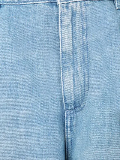 Jw Anderson Light Blue Bermuda Shorts With Cargo Pockets And Logo Patch On The Back