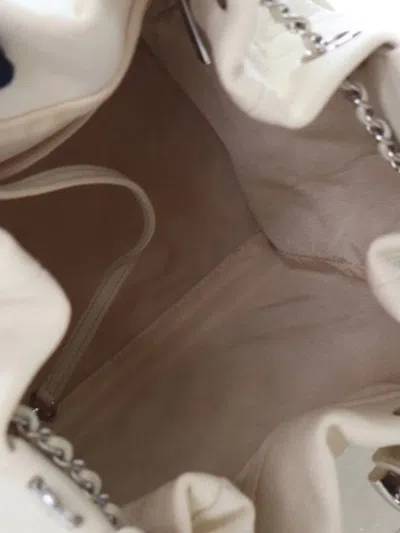 Pre-owned Chanel 2018-2019 Small Quilted Caviar Flat Drawstring Chain Bucket Bag In White