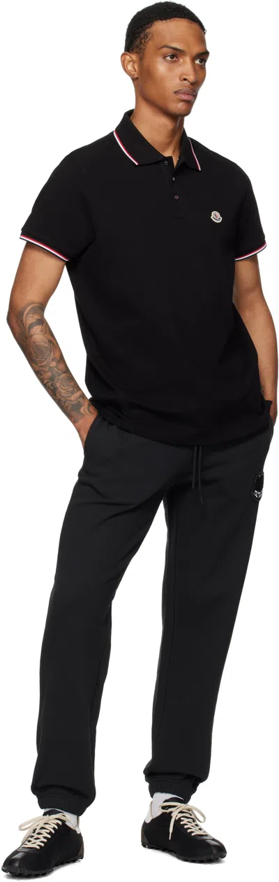 Moncler This Polo Shirt Features A Timeless Design That Transcends The Seasons In Black