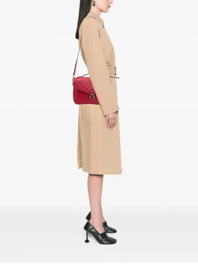 Pre-owned Louis Vuitton 2018 Monogram Empreinte Pochette Metis Satchel In Red