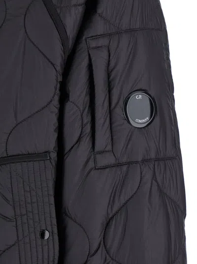 C.p. Company Black Jacket With Fixed Hood And Logo Plaque On The Sleeve In Black