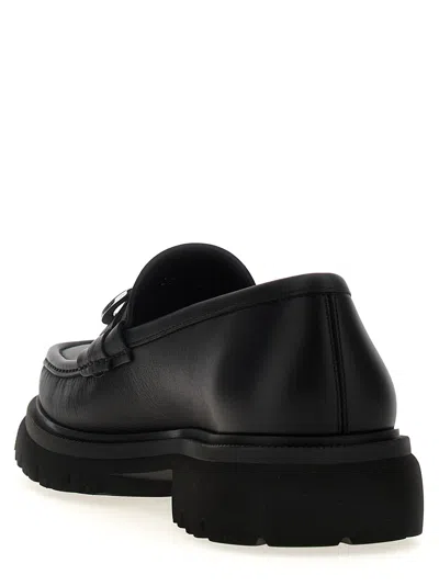 Ferragamo Chunky Sole Loafers With Metal Buckle Detail In Black