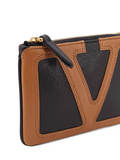 Valentino Lightened Surveytar In Leather Clutch Bags