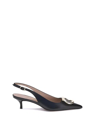 Ferragamo Gancini Slingback Pumps In Black