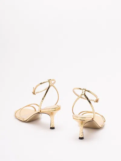 Jimmy Choo 1998 Leo 65 Metallic Leather Sandals In Gold