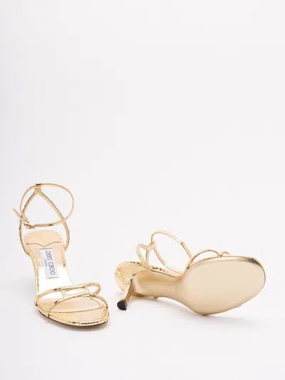Jimmy Choo 1998 Leo 65 Metallic Leather Sandals In Gold