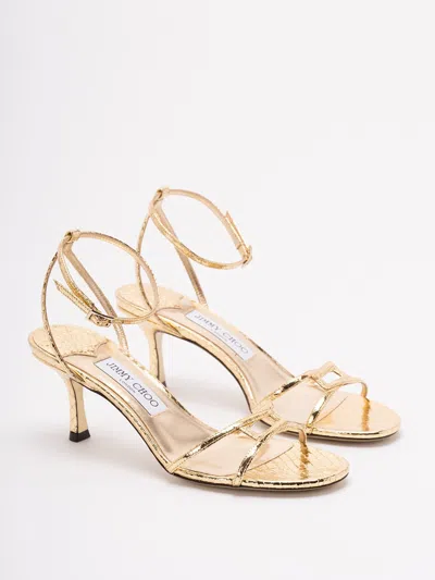 Jimmy Choo 1998 Leo 65 Metallic Leather Sandals In Gold