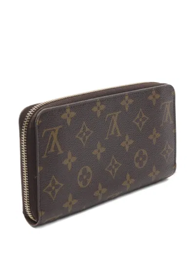 Pre-owned Louis Vuitton 2010 Zippy Wallet In Brown